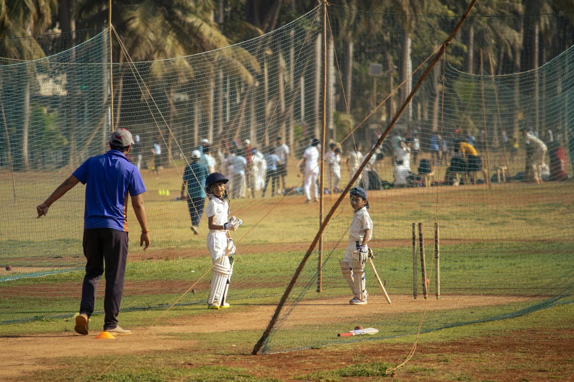Children playing sports in an Indian village ground
